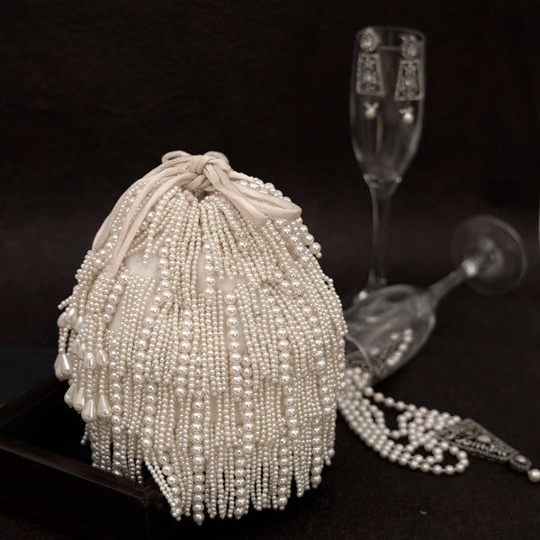 Pink half frame pearl potli bag with tassels – Crafty Clutchz - The  Handmade Store